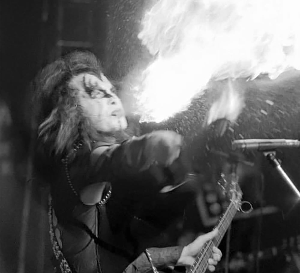 Gene Simmons breathing fire live for the first time