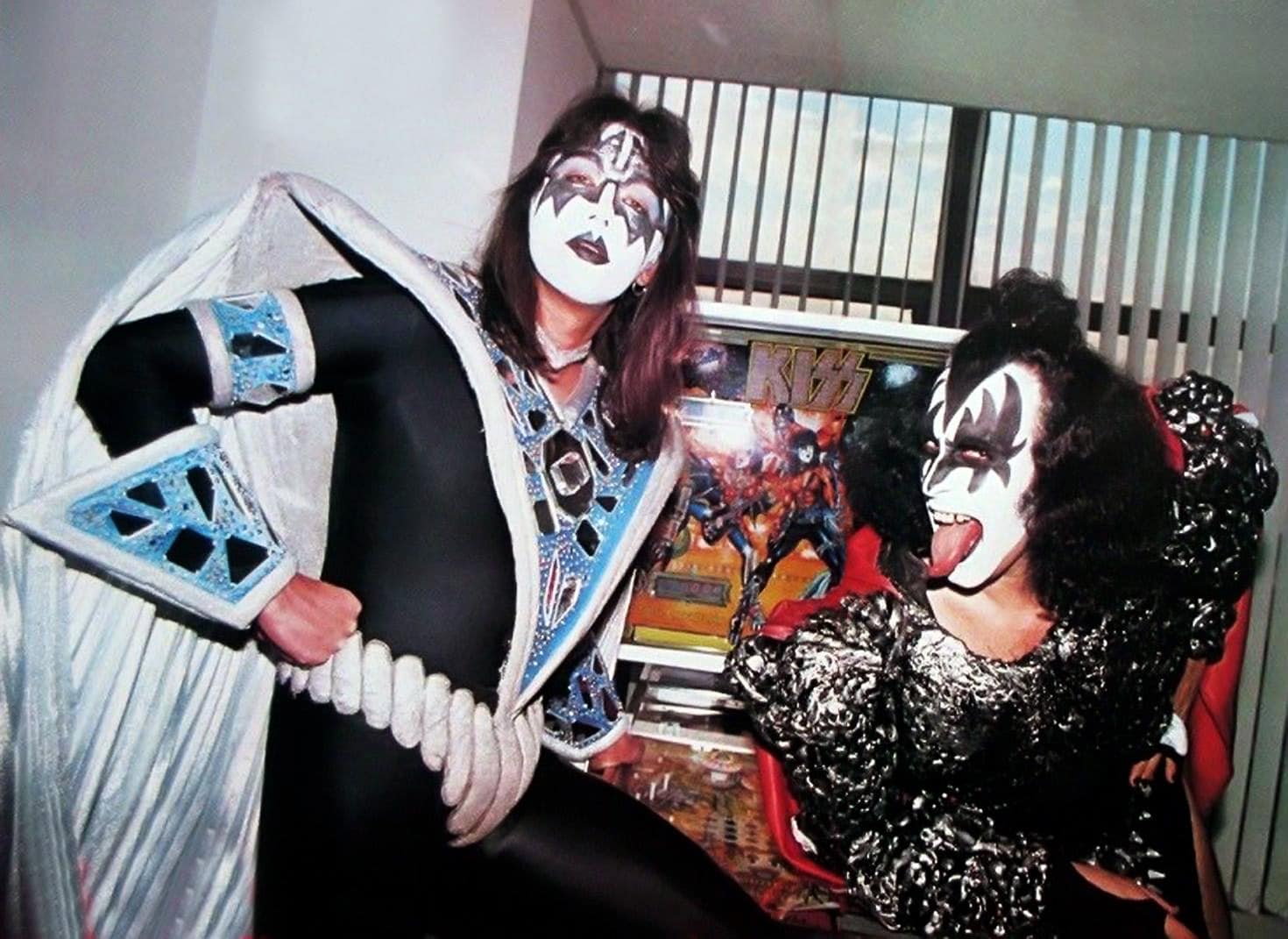 Ace Frehley and Gene Simmons with the Kiss pinball machine, 1980