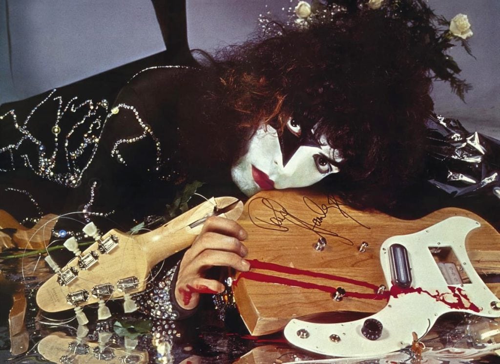 Paul Stanley smashing guitar on stage for the first time