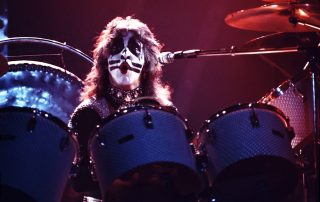 Peter Criss playing at the "Rock and Roll Over" tour dress rehearsal at Camp Curtis Guild, 15. November 1976. Photo by Richard Aaron.
