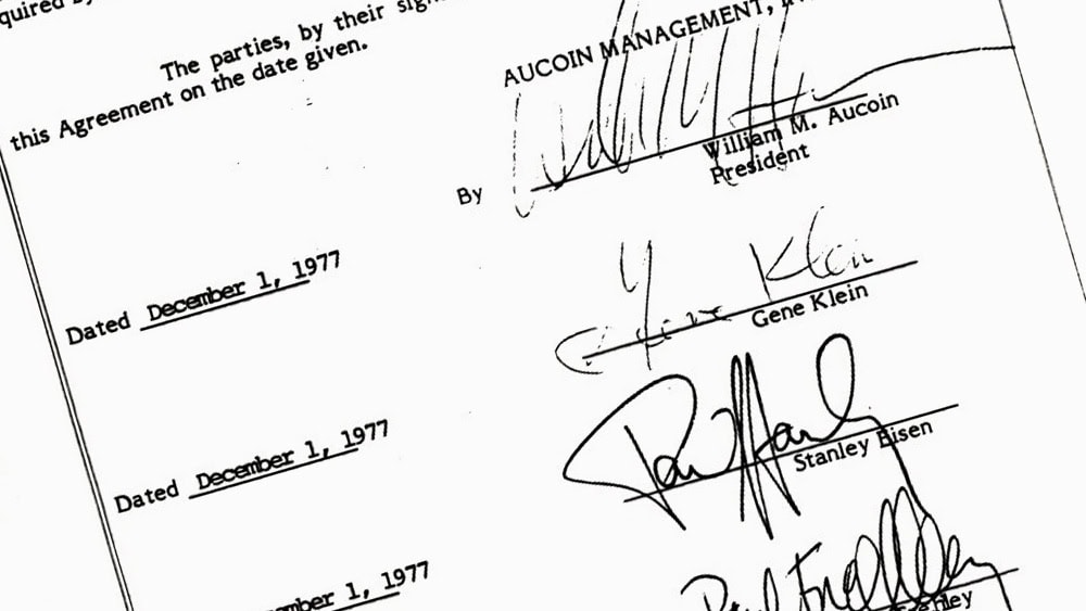 On 1. December, 1977, Kiss signed assignment of copyrights agreement with Aucoin Management.
