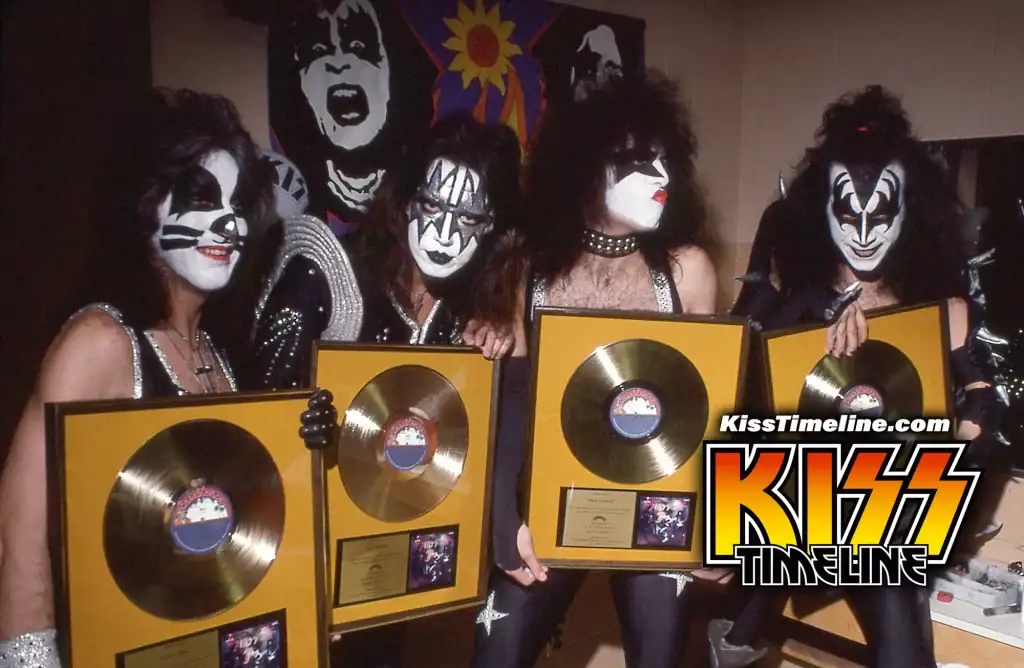 On 4. December, 1975, Kiss' first live album, "Alive!", was certified Gold by the The Recording Industry Association of America (RIAA), making it their very first Gold award by reaching 500,000 sales of an album. The award was presented backstage at the Nassau Coliseum, Uniondale, New York, before their show on New Year’s Eve 1975.