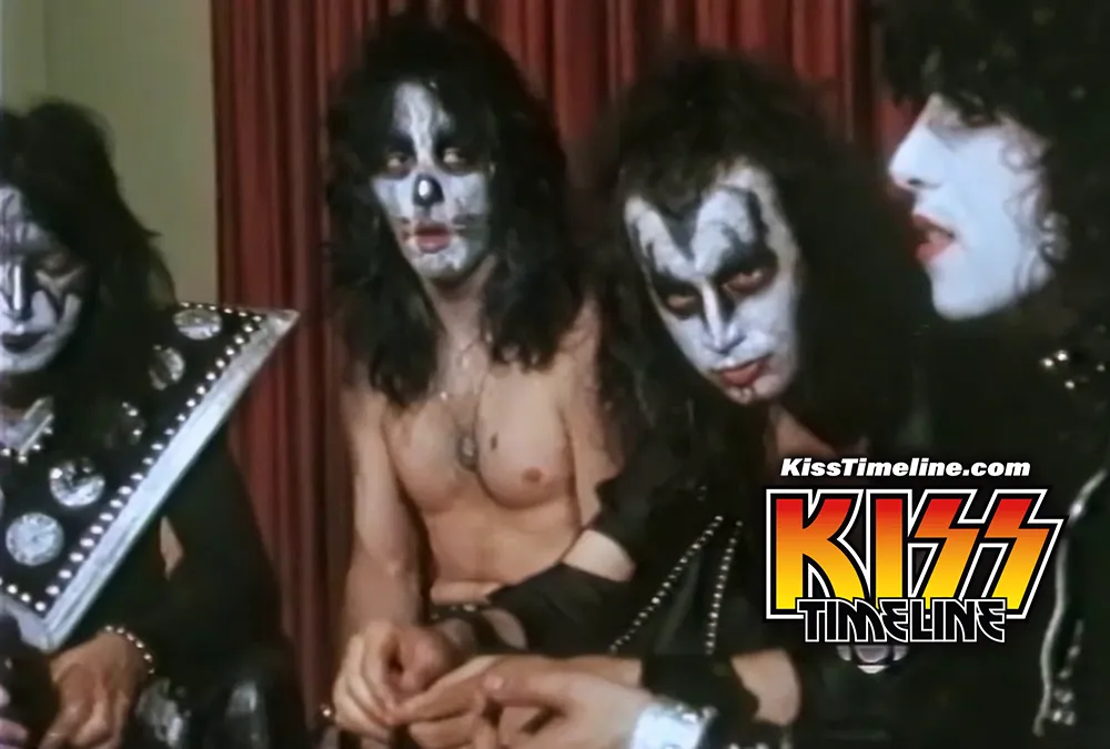 On 15. June, 1974, Kiss was filmed performing at Massey Hall in Toronto, Canada, and interviewed backstage by CBC News after opening for the New York Dolls before an audience of 2,800. The footage and interview were later featured in a CBC documentary “Glitter Rock”.