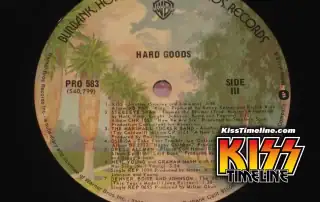 On 29. May, 1974, Kiss made their first compilation album appearance, with the song “Strutter” featured on Warner Bros.’ double LP “Hard Goods”.